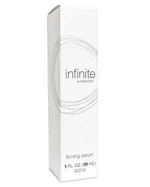 infinite by Forever Firming Serum 30ml bottle in brushed silver with clear pump cap on a pink background, applied to firm and hydrate the skin.